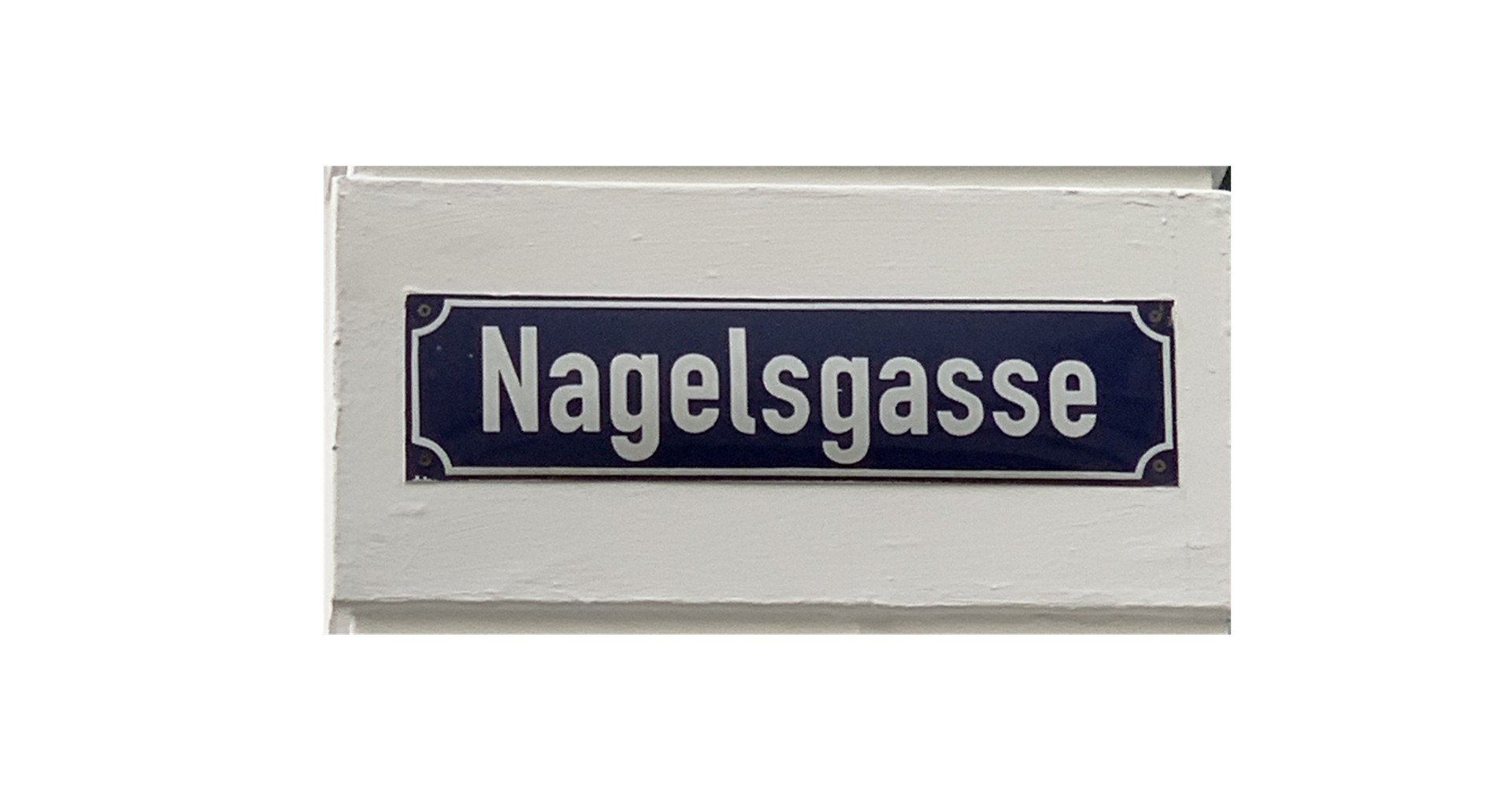 Foto toont straatnaambord met "Nagelsgasse"