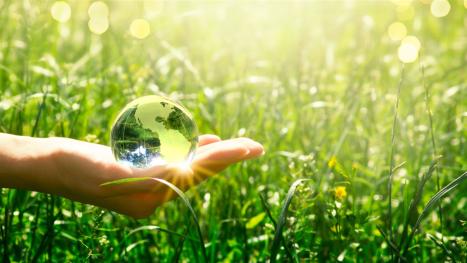 Afbeelding of energielabel toont een glazen bol voor een groene weide.
